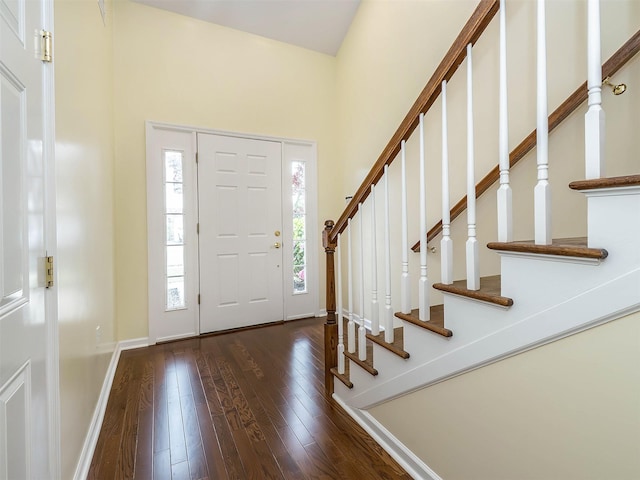 195 Pond View Dr Unit Ca0208, Port Washington, NY 11050 - entrance foyer featuring hardwood / wood-style flooring, stairs, and a high ceiling