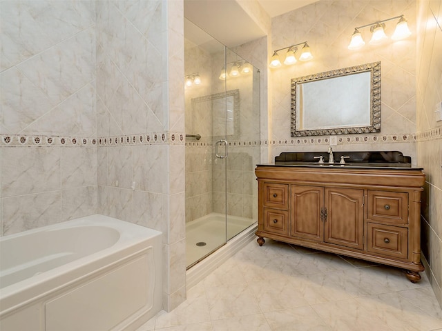 195 Pond View Dr Unit Ca0208, Port Washington, NY 11050 - full bath with tile walls, a shower stall, a bath, and vanity