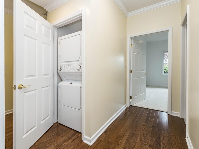 195 Pond View Dr Unit Ca0208, Port Washington, NY 11050 - washroom featuring stacked washer / drying machine, ornamental molding, and dark wood-style floors
