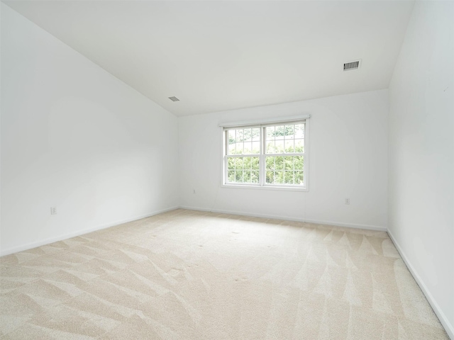 195 Pond View Dr Unit Ca0208, Port Washington, NY 11050 - spare room featuring lofted ceiling and carpet floors