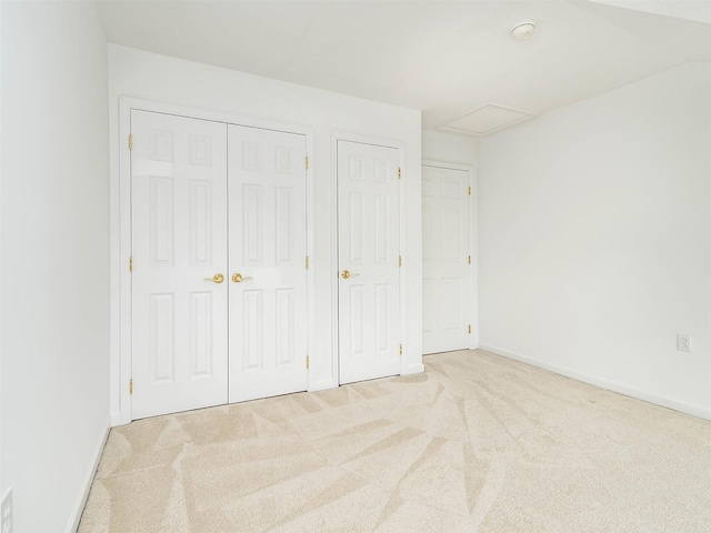 195 Pond View Dr Unit Ca0208, Port Washington, NY 11050 - unfurnished bedroom with carpet and a closet