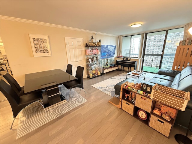 2 Bay Club Dr Unit 11T, Bayside, NY 11360 - living room with wood finished floors and crown molding