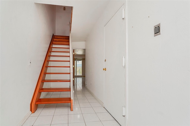 21 Carol Pl, Staten Island, NY 10303 - stairs with tile patterned floors and baseboards