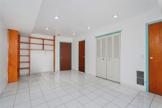 21 Carol Pl, Staten Island, NY 10303 - unfurnished bedroom with recessed lighting and light tile patterned floors