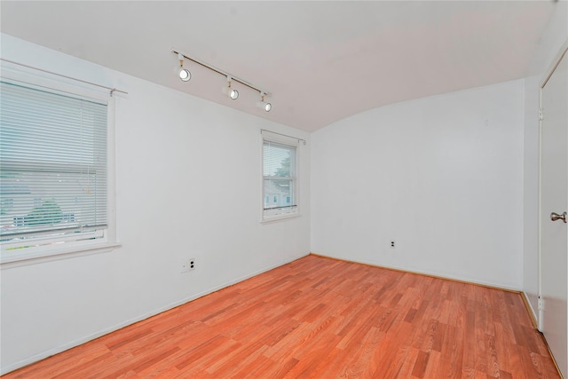21 Carol Pl, Staten Island, NY 10303 - unfurnished room with light wood-type flooring and track lighting