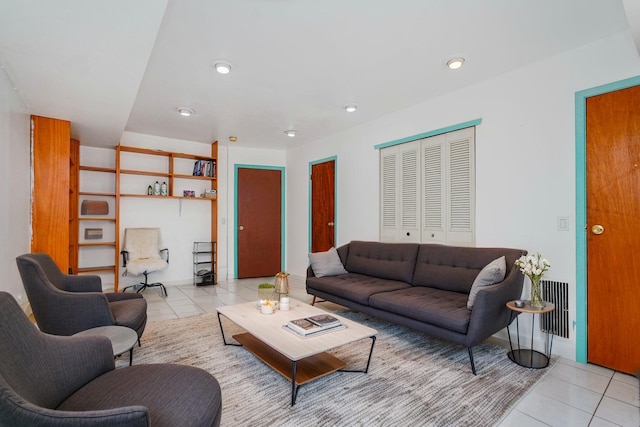 21 Carol Pl, Staten Island, NY 10303 - living room featuring light tile patterned floors and recessed lighting