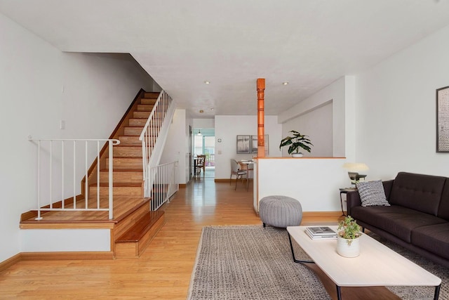 21 Carol Pl, Staten Island, NY 10303 - living area featuring light wood-type flooring and stairway