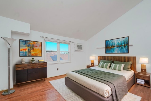 21 Carol Pl, Staten Island, NY 10303 - bedroom with light wood-style flooring, lofted ceiling, and an AC wall unit
