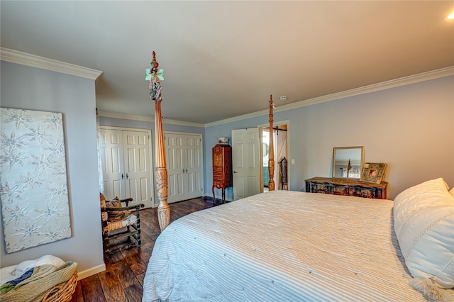 60 Jeremy Cir, Nesconset, NY 11767 - bedroom with dark wood finished floors, crown molding, and multiple closets