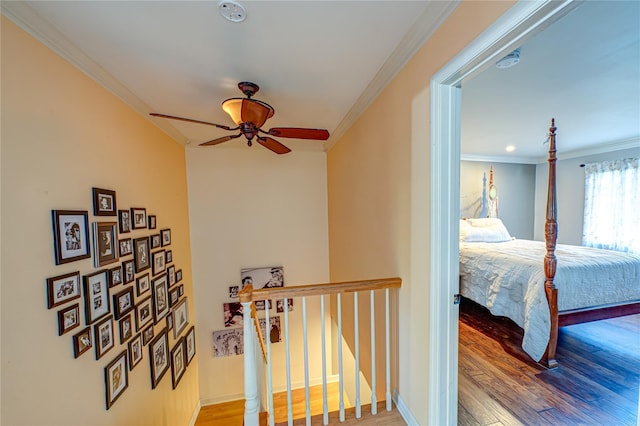 60 Jeremy Cir, Nesconset, NY 11767 - corridor with crown molding, wood finished floors, and an upstairs landing