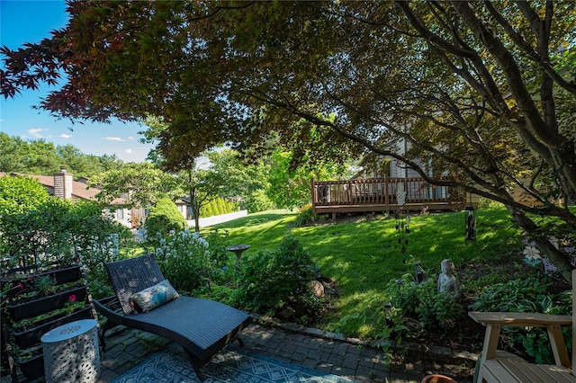 60 Jeremy Cir, Nesconset, NY 11767 - view of green lawn featuring a patio area and a wooden deck