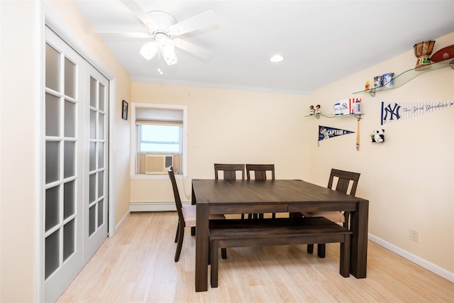 4 Wagon Ln, Levittown, NY 11756 - dining area featuring a baseboard radiator, light wood-style floors, cooling unit, ceiling fan, and recessed lighting