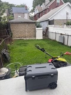 8602 89th St, Woodhaven, NY 11421 - view of yard featuring a shed