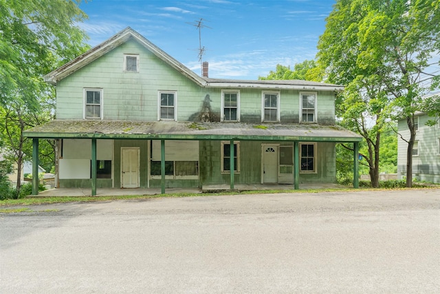 50 Maple St, Catskill, NY 12414 - view of front of property with a porch and a chimney
