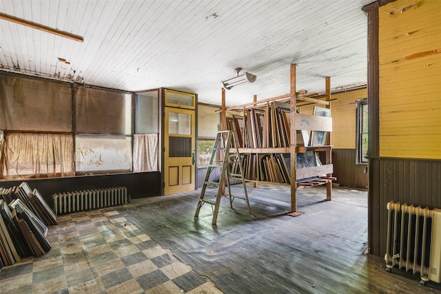 50 Maple St, Catskill, NY 12414 - misc room with radiator heating unit and wooden walls