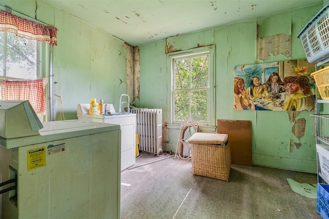 50 Maple St, Catskill, NY 12414 - laundry area with radiator and washer and clothes dryer
