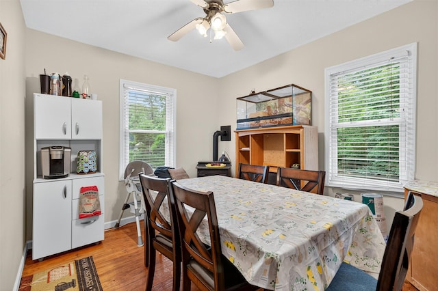 8 First St, Godeffroy, NY 12729 - dining area featuring a ceiling fan and light wood finished floors