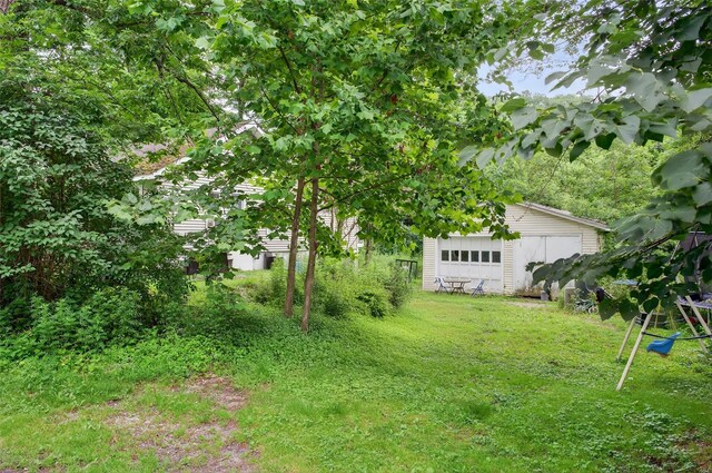 8 First St, Godeffroy, NY 12729 - view of green lawn featuring an outbuilding