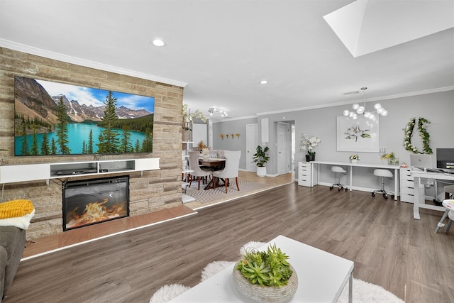 46 Alta Pl, Yonkers, NY 10710 - living area with crown molding, wood finished floors, a chandelier, a skylight, and recessed lighting