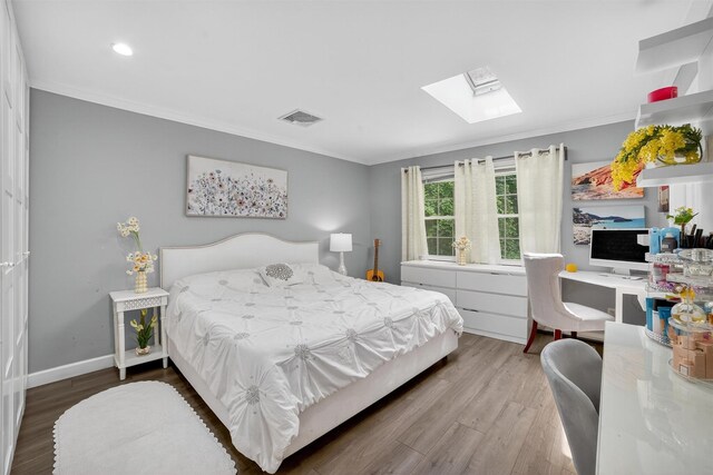 46 Alta Pl, Yonkers, NY 10710 - bedroom with a skylight, ornamental molding, wood finished floors, and recessed lighting
