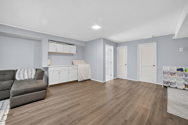 46 Alta Pl, Yonkers, NY 10710 - sitting room with light wood-style floors and baseboards