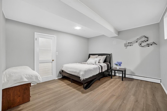 46 Alta Pl, Yonkers, NY 10710 - bedroom featuring baseboard heating and light wood-style flooring