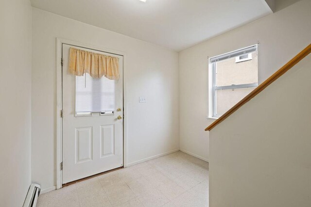180 Depew Ave, Nyack, NY 10960 - entryway featuring a baseboard heating unit and baseboards
