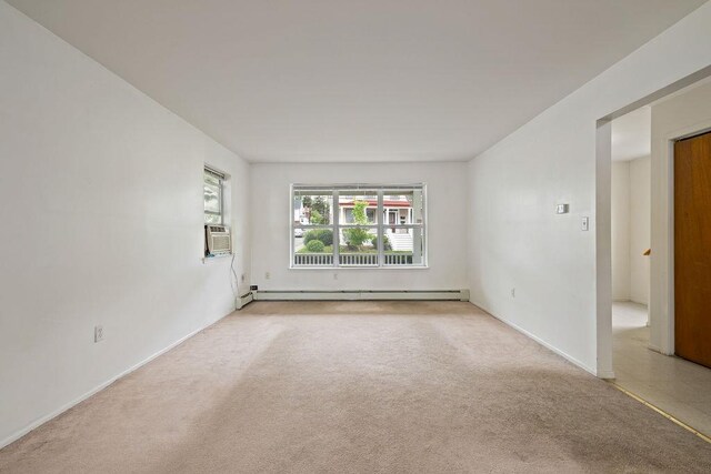 180 Depew Ave, Nyack, NY 10960 - carpeted empty room with baseboard heating and cooling unit