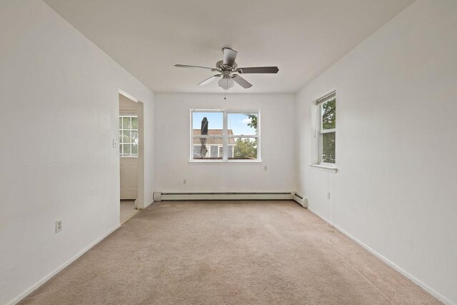 180 Depew Ave, Nyack, NY 10960 - carpeted spare room with a baseboard heating unit and ceiling fan
