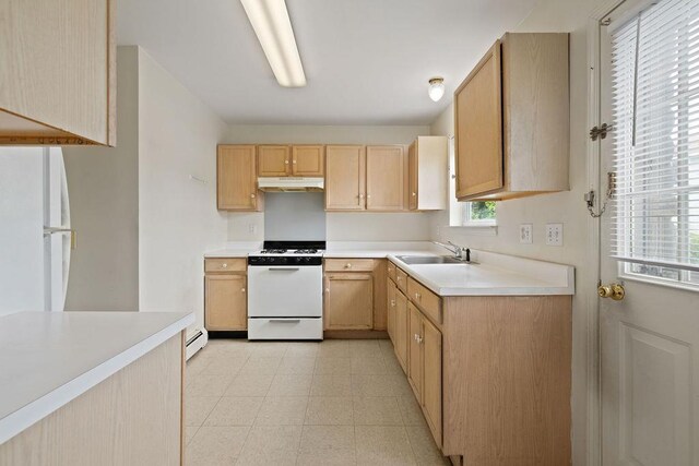 180 Depew Ave, Nyack, NY 10960 - kitchen featuring white appliances, under cabinet range hood, light countertops, light flooring, and light brown cabinetry