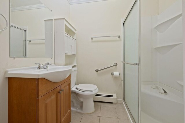 180 Depew Ave, Nyack, NY 10960 - bathroom with baseboard heating, tile patterned flooring, a shower with shower door, and vanity