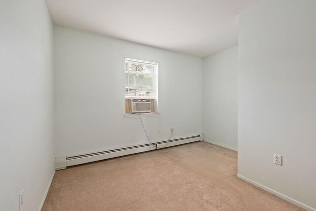 180 Depew Ave, Nyack, NY 10960 - empty room featuring baseboard heating, cooling unit, and carpet floors