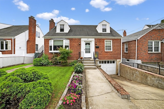 167 Hillview Ave, Yonkers, NY 10704 - cape cod home featuring driveway, a garage, brick siding, and a shingled roof