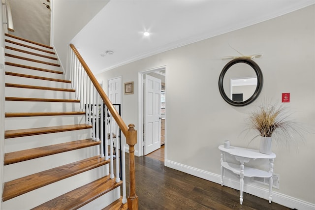 167 Hillview Ave, Yonkers, NY 10704 - stairway with wood finished floors, ornamental molding, and recessed lighting