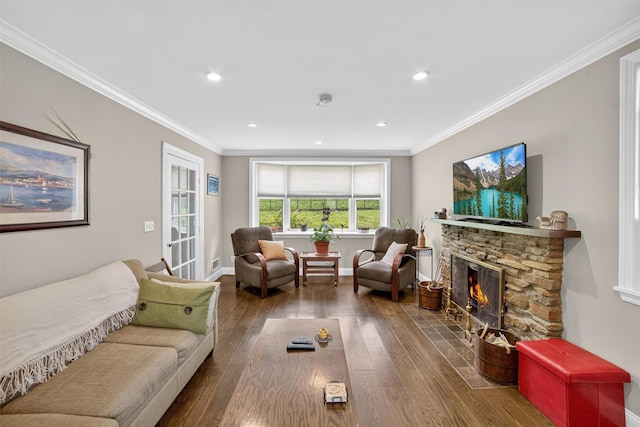 167 Hillview Ave, Yonkers, NY 10704 - living room featuring a stone fireplace, wood finished floors, crown molding, and recessed lighting