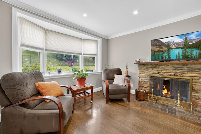 167 Hillview Ave, Yonkers, NY 10704 - living area with crown molding, wood finished floors, a stone fireplace, and recessed lighting