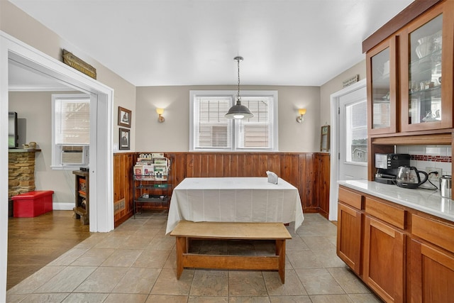 167 Hillview Ave, Yonkers, NY 10704 - dining room with a wainscoted wall, healthy amount of natural light, wood walls, and cooling unit