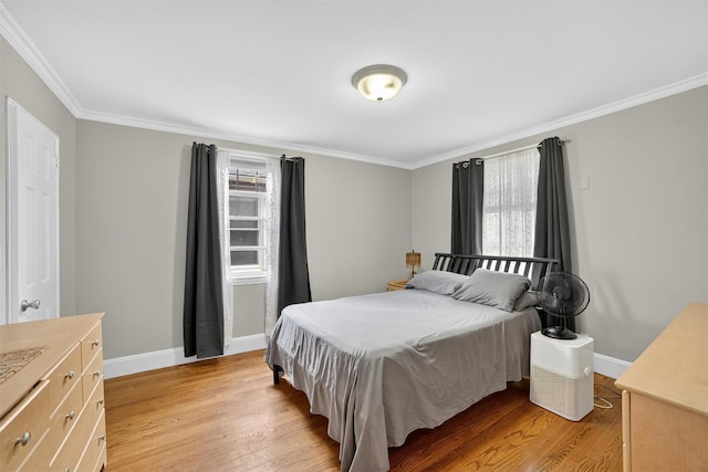 167 Hillview Ave, Yonkers, NY 10704 - bedroom featuring multiple windows, light wood-type flooring, and ornamental molding