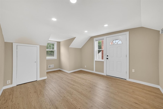 167 Hillview Ave, Yonkers, NY 10704 - entryway with light wood finished floors, vaulted ceiling, healthy amount of natural light, and recessed lighting