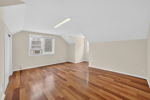 167 Hillview Ave, Yonkers, NY 10704 - additional living space featuring vaulted ceiling, light wood-style flooring, and cooling unit