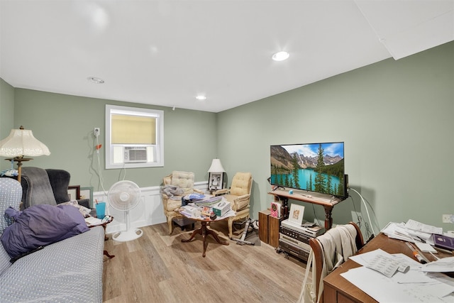 167 Hillview Ave, Yonkers, NY 10704 - living room featuring light wood-style flooring, cooling unit, and a wainscoted wall