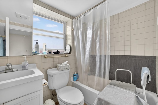 167 Hillview Ave, Yonkers, NY 10704 - bathroom featuring tile walls, shower / bath combo with shower curtain, and vanity