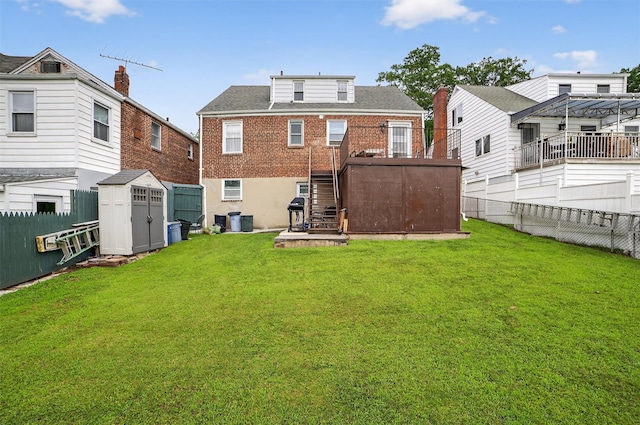 167 Hillview Ave, Yonkers, NY 10704 - back of house featuring stairs, a shed, a fenced backyard, brick siding, and a wall mounted air conditioner