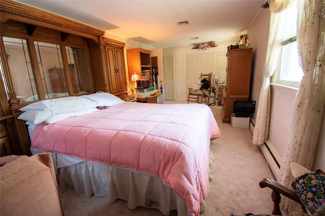 2083 Elm Pl, Merrick, NY 11566 - bedroom with baseboard heating and light colored carpet
