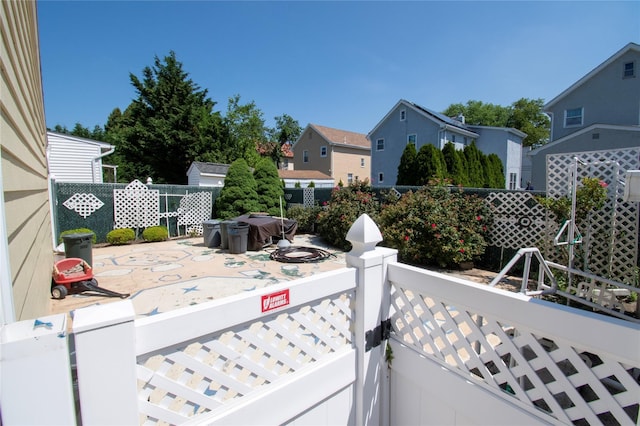 2083 Elm Pl, Merrick, NY 11566 - fenced backyard featuring a patio area