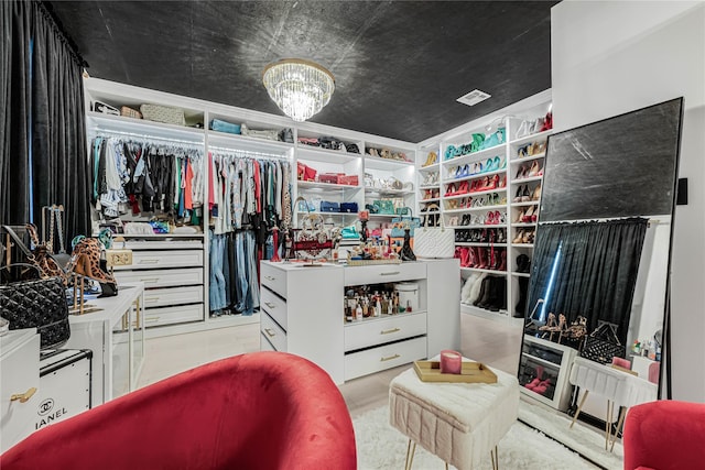 3 Fairview Ln, Glen Cove, NY 11542 - walk in closet featuring a chandelier