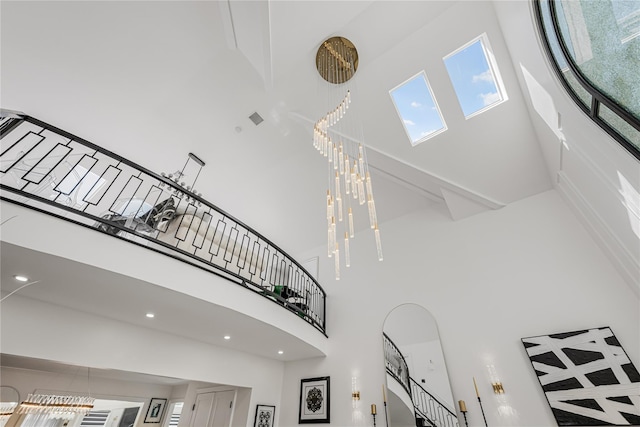 3 Fairview Ln, Glen Cove, NY 11542 - stairway featuring a towering ceiling and plenty of natural light