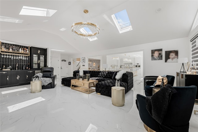3 Fairview Ln, Glen Cove, NY 11542 - living area featuring a skylight, lofted ceiling, marble tiled flooring, and bar area
