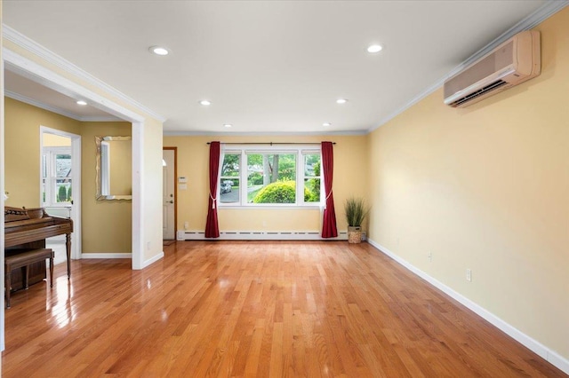 303 Helena Ave, Yonkers, NY 10710 - spare room featuring a wall mounted air conditioner, crown molding, baseboard heating, recessed lighting, and light wood finished floors