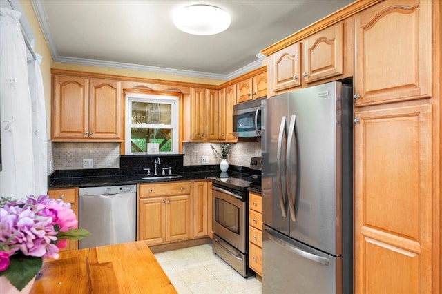 303 Helena Ave, Yonkers, NY 10710 - kitchen featuring appliances with stainless steel finishes, tasteful backsplash, and crown molding